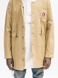 Coat opened. Up close detail of Elongated Cold War Work Jacket in Camel