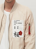 nylon light cream aeronautics flight jacket with cotton printed patchwork by profound aesthetic