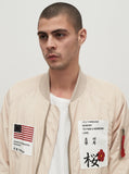 nylon light cream aeronautics flight jacket with cotton printed patchwork by profound aesthetic