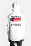 Hood up, back view of Four Flag Worldwide Hooded Windbreaker Coach Jacket in White on model