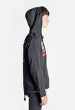 Hood up right side of Four Flag Worldwide Hooded Windbreaker Coach Jacket in Black on model
