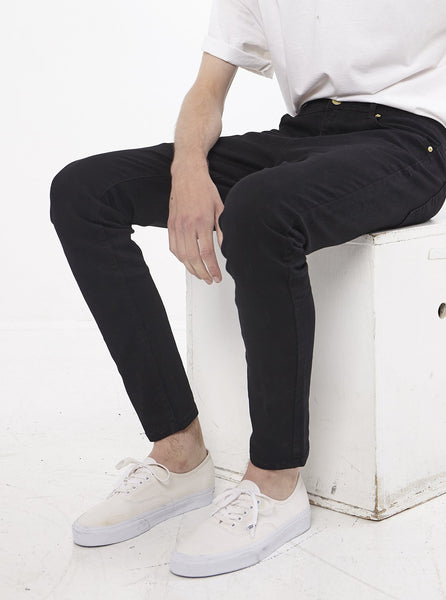 Jet black skinny fit denim jeans by profound aesthetic