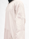 Close up view of Mesh Pocket Nylon Crewneck in Cream on model, showcasing mesh details
