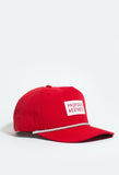 Side angle shot of Nylon Snapback Box Logo Hat in Red