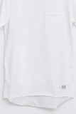 Close up view of Basic Raw-Cut Elongated Short Sleeve Tee in Off-White