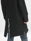 Back view of Elongated Hooded Pullover Trench in Black on model, featuring fishtail rear zipper
