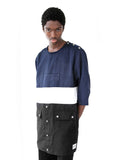 Candid shot of Color Blocked Elongated Split-Seam Windbreaker Nylon Pullover in Navy/White/Black on model