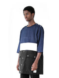 Side angle view of Color Blocked Elongated Split-Seam Windbreaker Nylon Pullover in Navy/White/Black on model