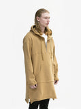 Side angle view of Elongated Hooded Pullover Trench in Khaki on model