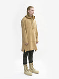 Full body side angle image of Elongated Hooded Pullover Trench in Khaki on model