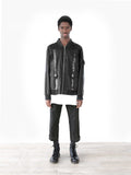 Head to toe shot of Lone Sentry Strap Jacket in Black on model, paired with Basic Raw-Cut Elongated Short Sleeve Tee in Off-White and black slacks