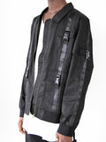 Close up front detail of Lone Sentry Strap Jacket in Black on model