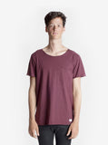 Front view of Basic Raw-Cut Elongated Short Sleeve Tee in Oxblood on model