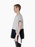 Left side view of Cut-Off Color Blocked Kangaroo Sweatshirt Tee in Gray/Black highlighting side slit detail with adjustable drawstrings