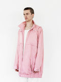 Side angle view of Rose Collins Box Jacket in Light Pink on model