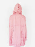 Hood up, back view of Rose Collins Box Jacket in Light Pink on model