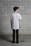 Full body back view of Basic Raw-Cut Elongated Short Sleeve Tee in Heather Gray on model