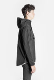 Right side view of Torpedo Pocket Anorak Pullover Windbreaker Jacket in Midnight Black on model