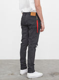 Washed faded black destroyed distressed denim jeans by profound aesthetic