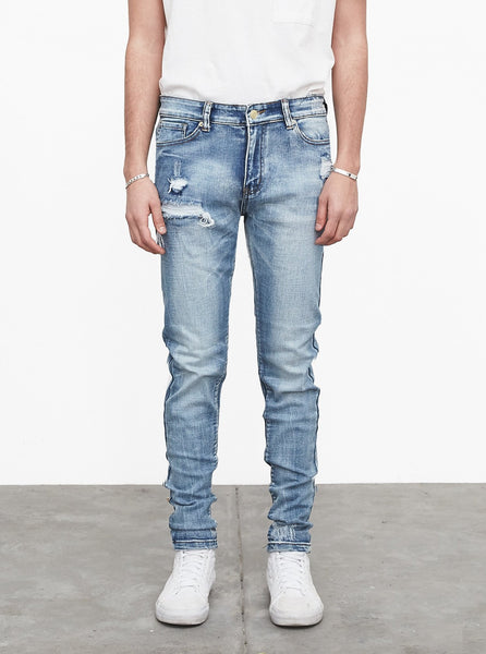 Light Acid wash blue distressed denim jeans by profound aesthetic