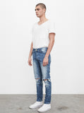 Medium Blue wash blue destroyed distressed denim jeans by profound aesthetic