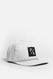 Side angle view of Box PA Snapback Hat in Off-White