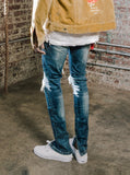 Dark Blue washed distressed denim destroyed skinny fit jeans by profound aesthetic