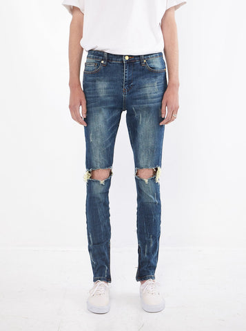 Dark Blue washed distressed denim destroyed skinny fit jeans by profound aesthetic