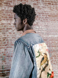 Vintage wash blue denim jacket with back cotton panel patch of birds and floral called song of birds by profound aesthetic