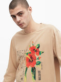 Dripping Hibiscus Calligraphy Printed Graphic Long Sleeve Crewneck Tee in Light Camel