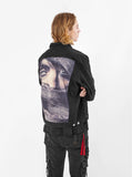 Vintage wash distressed black denim jacket with back cotton panel patch called eye gaze by profound aesthetic