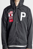 Up-close front details of Four Flag Worldwide Hooded Windbreaker Coach Jacket in Black