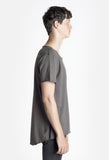 Right side view of Basic Raw-Cut Elongated Short Sleeve Tee in Gunmetal Gray on model