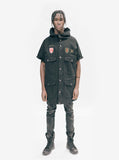 Fully zipped, head to toe shot of Half-Sleeve Military Parka in Black on model