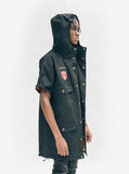 Hood up, side angle view of Half-Sleeve Military Parka in Black on model