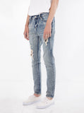 Medium Blue washed distressed paint splatter denim destroyed skinny fit jeans by profound aesthetic