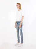 Medium Blue washed distressed paint splatter denim destroyed skinny fit jeans by profound aesthetic