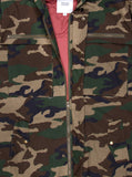 Close up detail front shot of Kengi Cotton Poncho in Woodland Camo, showing terracotta-colored inner lining