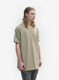 Side angle view of Basic Straight-Bottom Short Sleeve Tee in Light Army on model