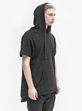 Side angle view of Reversed French Terry Pullover Raw-Cut Hoodie in Black on model with hood up 