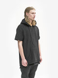 Side angle view of Reversed French Terry Pullover Raw-Cut Hoodie in Black on model