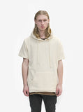 Front view of Reversed French Terry Pullover Raw-Cut Hoodie in Cream on model