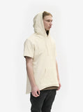 Side angle view of Reversed French Terry Pullover Raw-Cut Hoodie in Cream on model