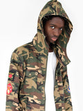 Candid shot of Battalion Woodland Double Layer Camo Patch Jacket on model