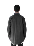 Back view of Elongated Button Down Canvas Shirt in Black on model