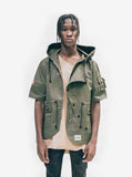 Front view of Short-Sleeve Asymmetrical Hooded Parka in Olive on model