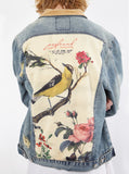 Vintage wash blue denim jacket with back cotton panel patch of birds and floral called song of birds by profound aesthetic
