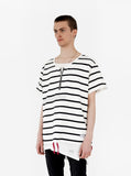 Side angle view of Neutral Stripe Half Sleeve Pullover Shirt in Black/Off-White on a model