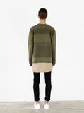 Full body back shot of Half Reversed Terry Panel Pullover in Olive on model, layered with Basic Raw-Cut Elongated Short Sleeve Tee in Sand and black denim