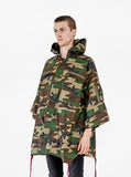 Side angle view of Kengi Cotton Poncho in Woodland Camo 